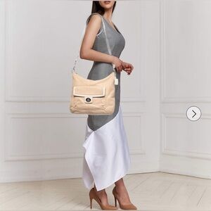 Coach Penelope Pebbled Leather Hobo Bag with Turnlock Front Pocket